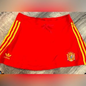 Adidas - red skirt with yellow trim